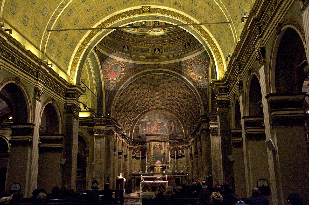 The altar and coffered false choir in Santa Maria presso San Satiro, seen along the nave.