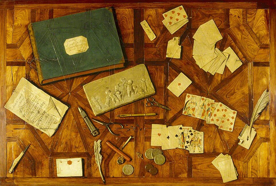 Boilly’s painted tabletop with playing cards, letters, coins, music, and tools.