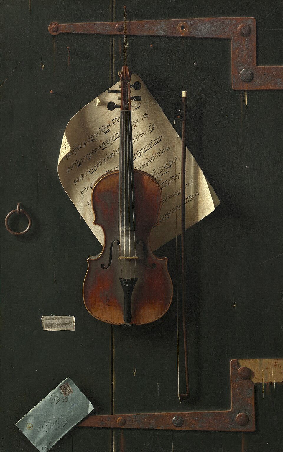 The Old Violin — A violin and scraps of paper seem to hang on a wooden door.