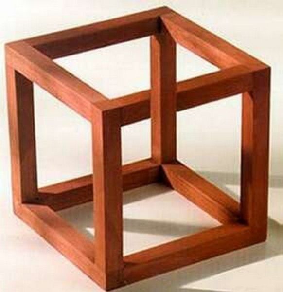 A wooden cube frame photographed from a viewpoint that conceals its incompatible connections.